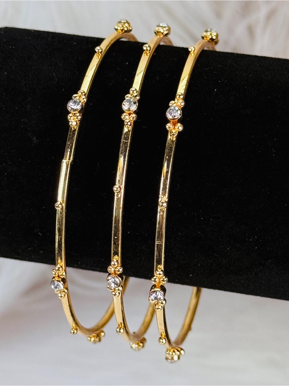 Minimalist, goldtone, clear bling, thin stackable set of 3 bangle bracelets 